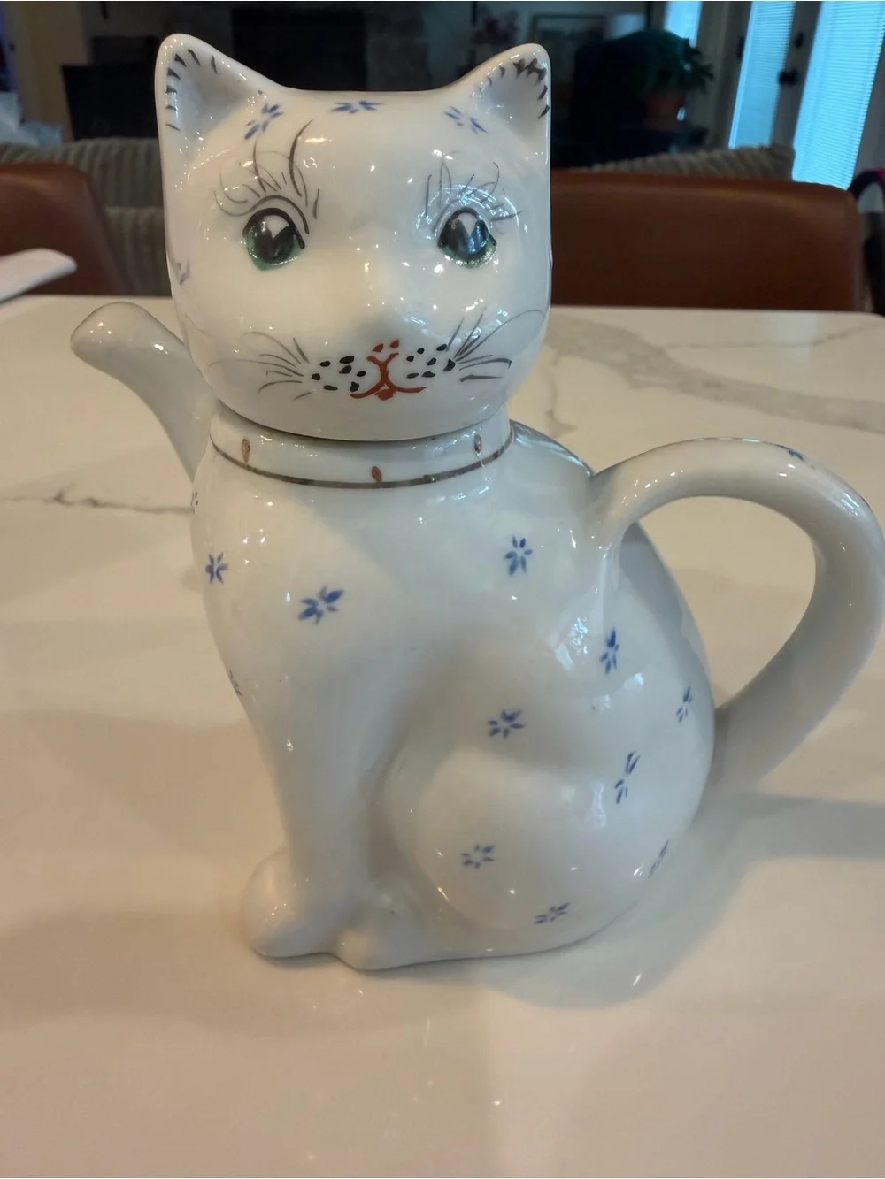 Ceramic White Cat Teapot with Blue Floral Accents